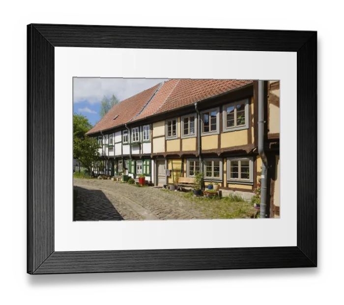 Framed Print : Restored half-timbered houses in the old town