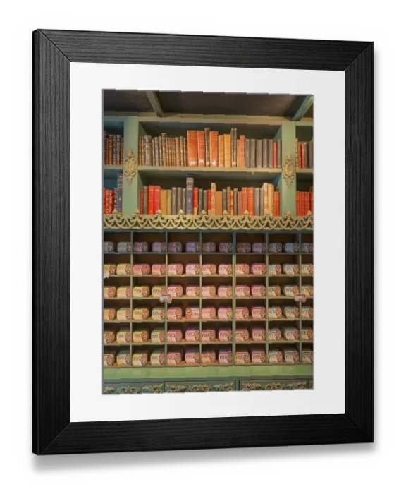 Framed Print : Shelf with antique books and colourful tins