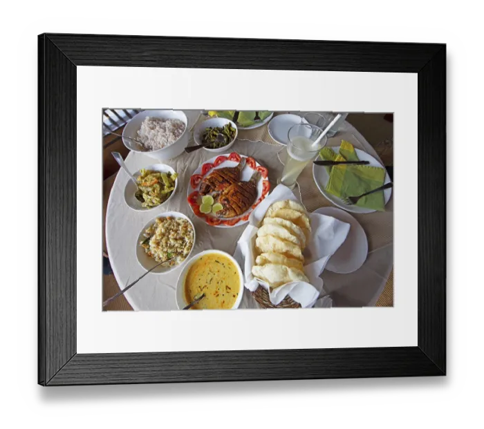 Framed Print : Traditional Kerala dishes, striped cichlid in the centre