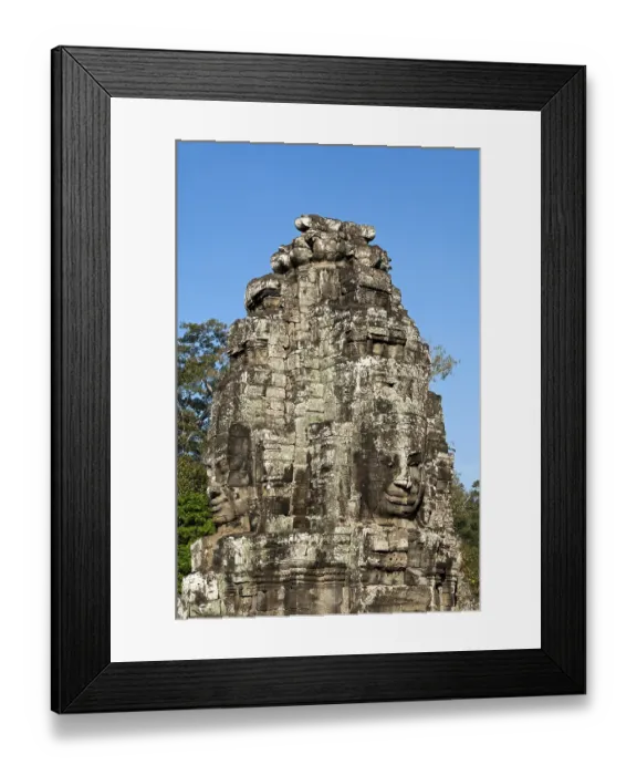 Framed Print : Tower with a face carved in stone