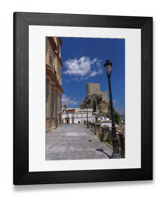 Framed Print : White village with La Encarnacion church on the Moorish hill
