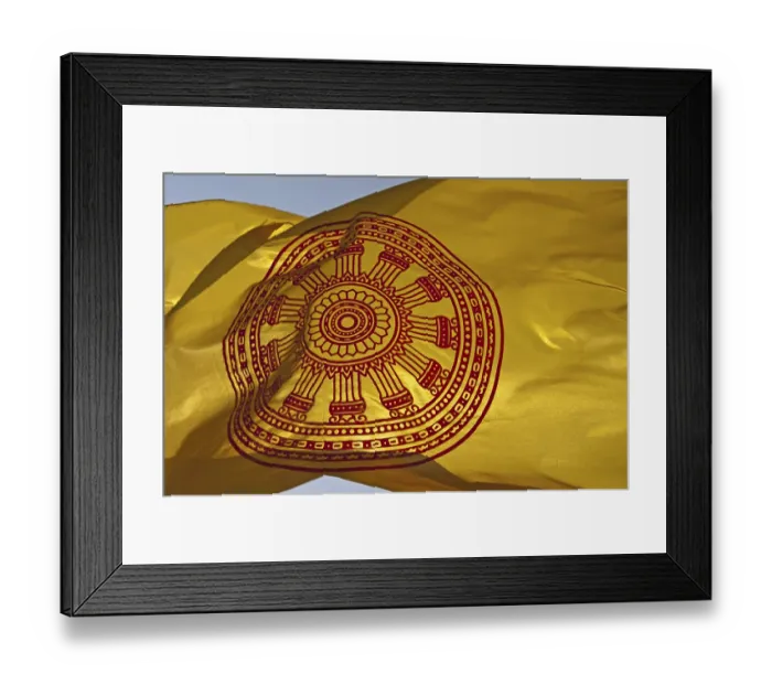 Framed Print : Buddhist flag with the Dharmacakra wheel symbolizing the Buddha's teachings