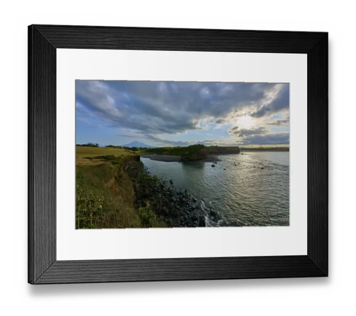 Framed Print : Coastal landscape with sea, cliffs and cloudy sky Framed Print : Coastal landscape with sea, cliffs and cloudy sky