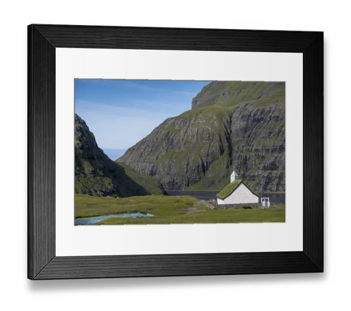 Framed Print : Small church with grass roof in mountain landscape