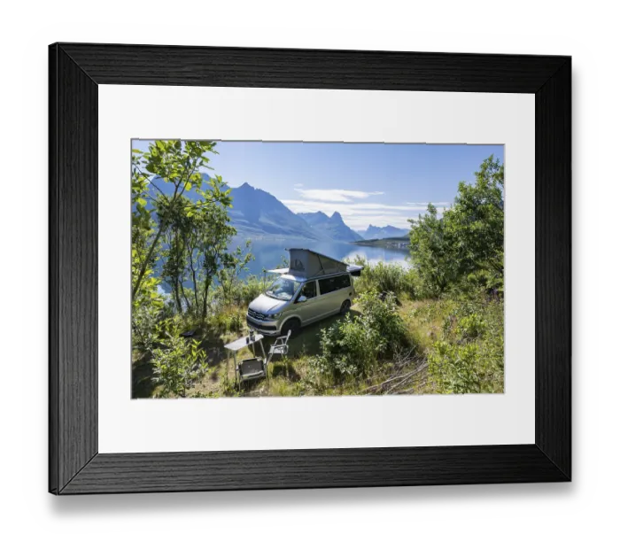 Framed Print : Camper standing by fjord with view of mountains