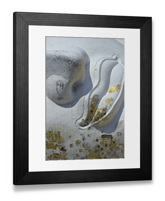 Framed Print : Mouth of a lying Buddha statue decorated with gold leaf
