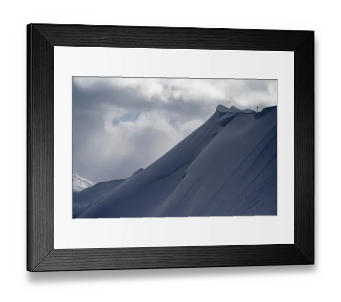 Framed Print : Summit cross of the Hoeferspitze with covered summit ridge