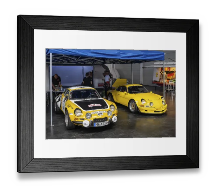 Framed Print : French Renault Alpine A110 racing cars in a paddock