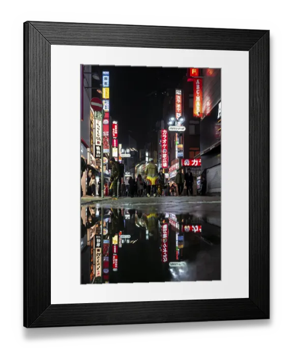 Framed Print : Pedestrian, street with illuminated advertising and advertising signs at night