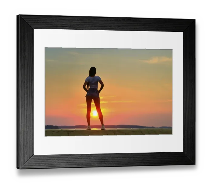 Framed Print : Back view of a silhouette of young woman standing on a pier at the sunset time Framed Print : Back view of a silhouette of young woman standing on a pier at the sunset time