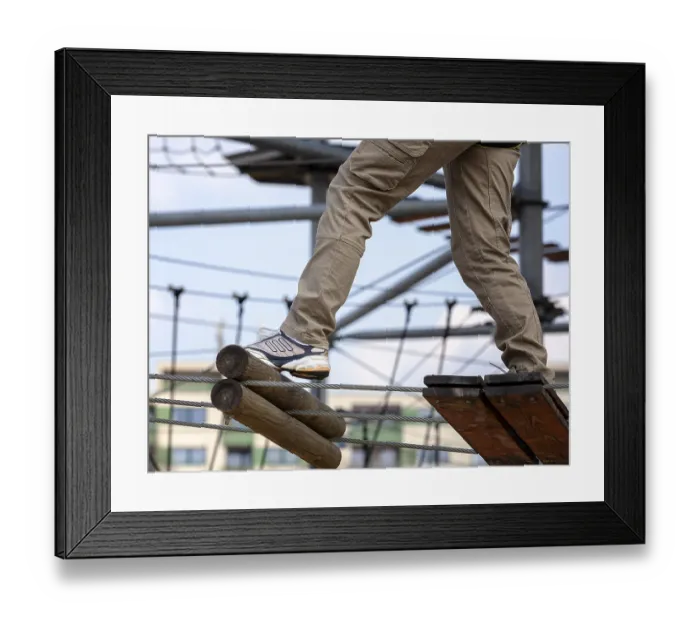 Framed Print : Sporty woman climbing in an outdoor park