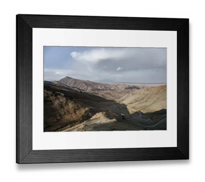 Framed Print : View of mountain landscape and pass road at Tyibel Pass