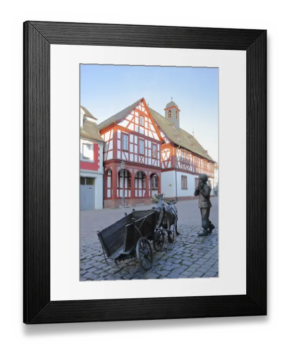 Framed Print : Sculpture with boy and broken cart in front of the town hall Framed Print : Sculpture with boy and broken cart in front of the town hall