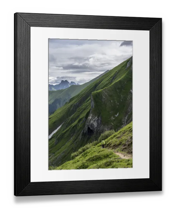 Framed Print : Hiker on a hiking trail, descending from the Rappenseehuette