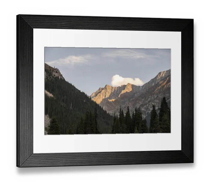Framed Print : Mountain peaks in the evening light