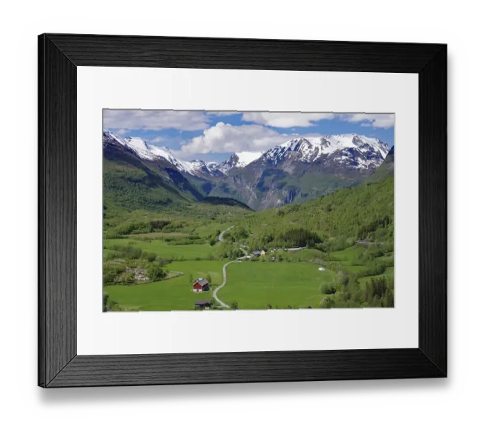 Framed Print : Alpine meadows in a wide landscape and snowy mountains