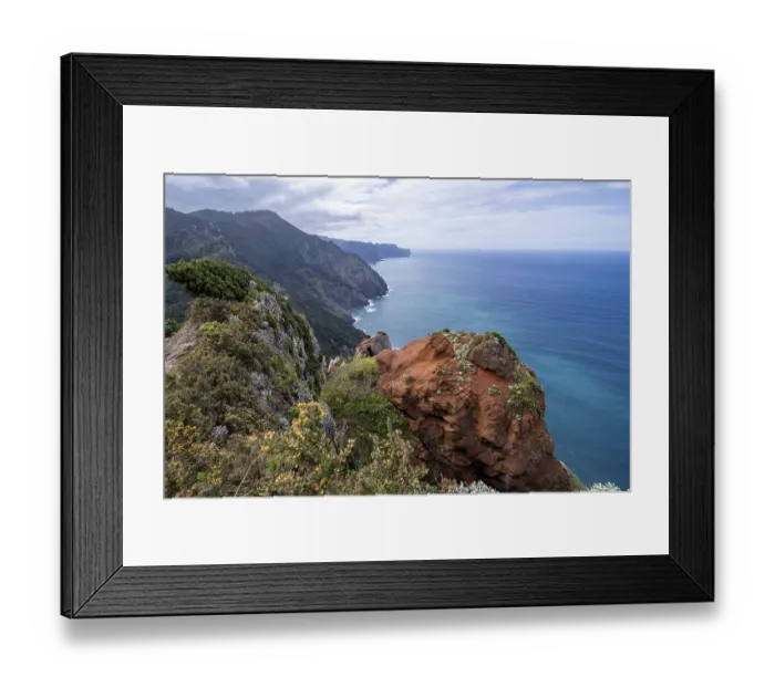 Framed Print : View of cliffs and mountains overgrown with forest