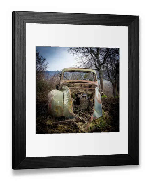 Framed Print : Old truck carcass rusty and boned amidst fields in winter
