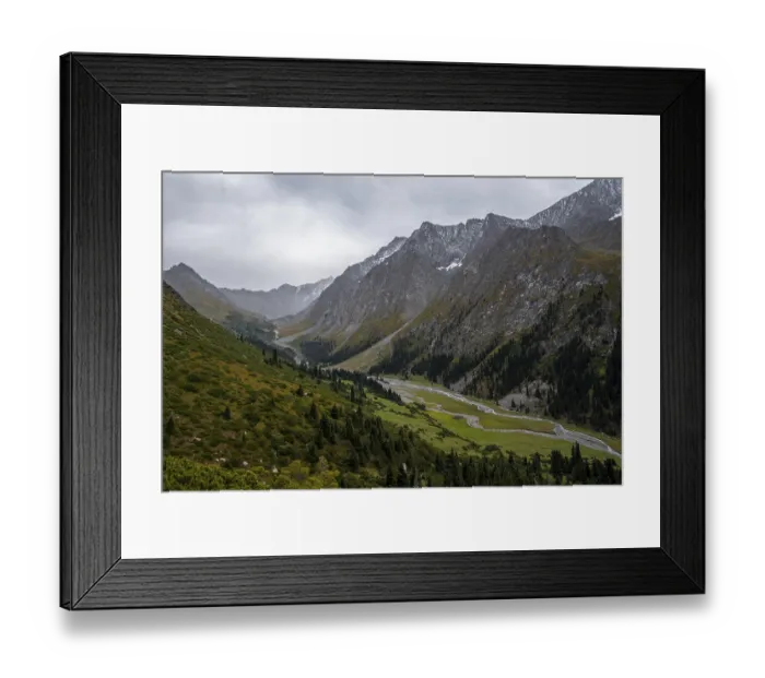 Framed Print : Green mountain valley with river and steep mountain peaks