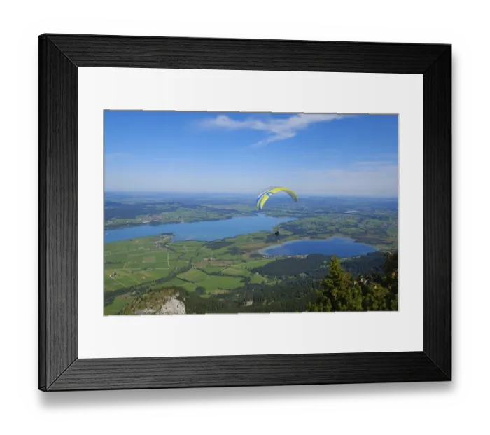 Framed Print : Paragliding over Bannwaldsee and Forggensee