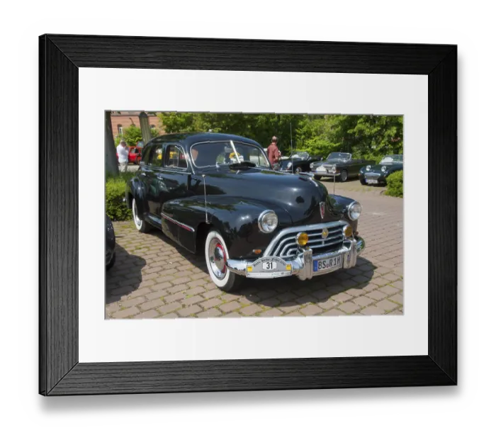 Framed Print : Black classic vintage car with chrome details