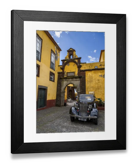 Framed Print : Vintage car parked in front of yellow gate and wall Framed Print : Vintage car parked in front of yellow gate and wall