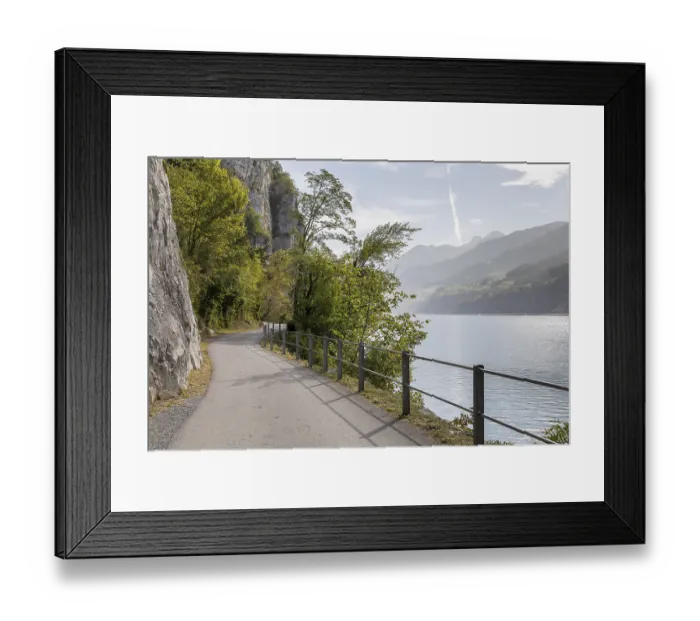Framed Print : Path with a view along the steep rock faces on the northern shore of Lake Walen Framed Print : Path with a view along the steep rock faces on the northern shore of Lake Walen