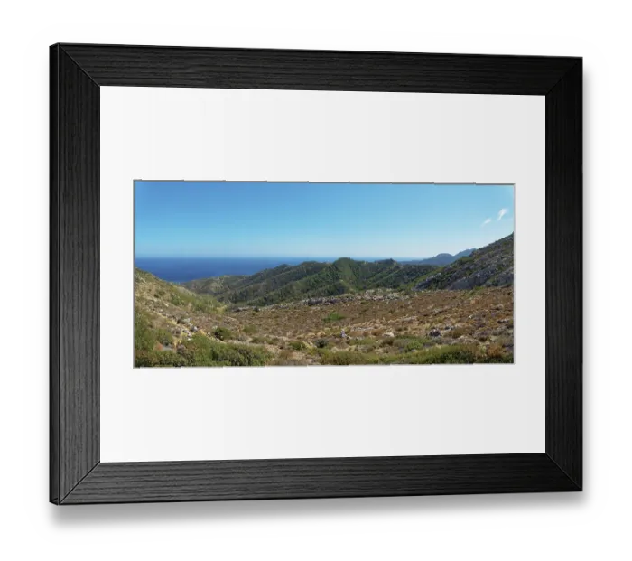 Framed Print : Wide landscape on the hiking trail from Avlona to Diafani with mountains stretching to the sea