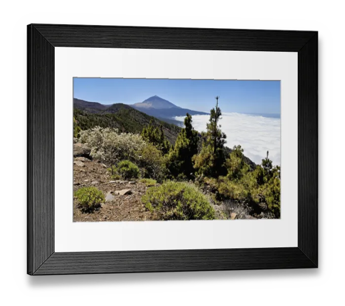 Framed Print : Volcanic landscape, behind volcano Pico del Teide above trade wind clouds