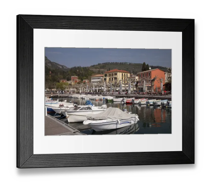 Framed Print : Boats moored in the harbour, promenade with Villa Albertini