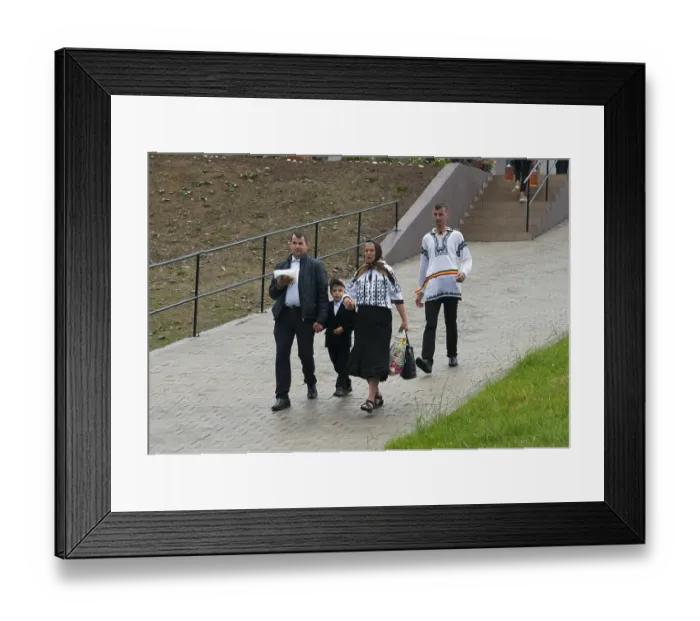 Framed Print : Family in traditional dress on a cosy walk