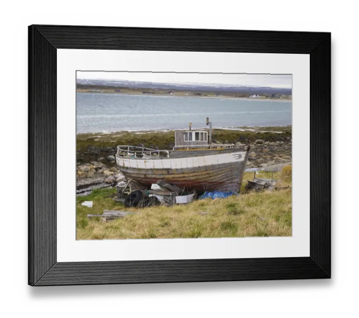 Framed Print : Derelict fishing boat on the shore of the Arctic Ocean