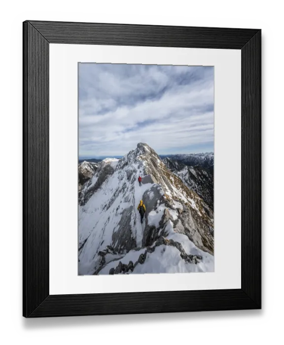 Framed Print : Two mountaineers on a rocky snowy ridge