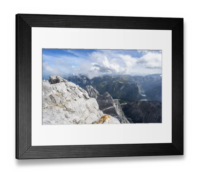 Framed Print : Mountaineer on the rocky summit of the Watzmann Mittelspitze