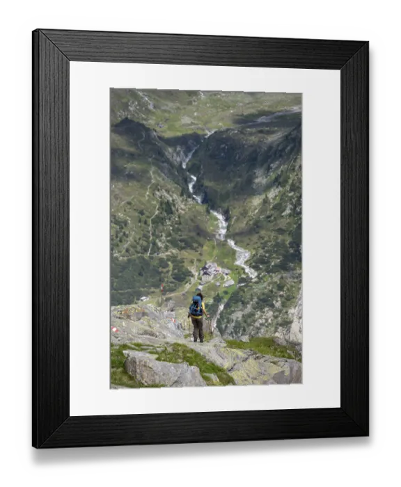 Framed Print : Mountaineer in front of picturesque mountain landscape