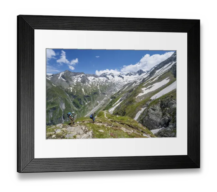Framed Print : Mountaineer on hiking trail in picturesque mountain landscape Framed Print : Mountaineer on hiking trail in picturesque mountain landscape
