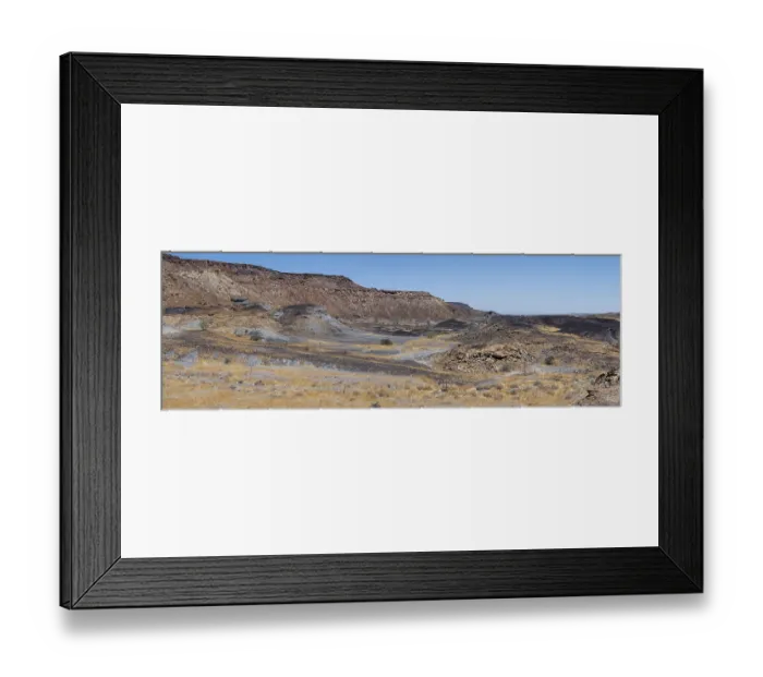 Framed Print : Dry landscape with yellow grass and black volcanic hills