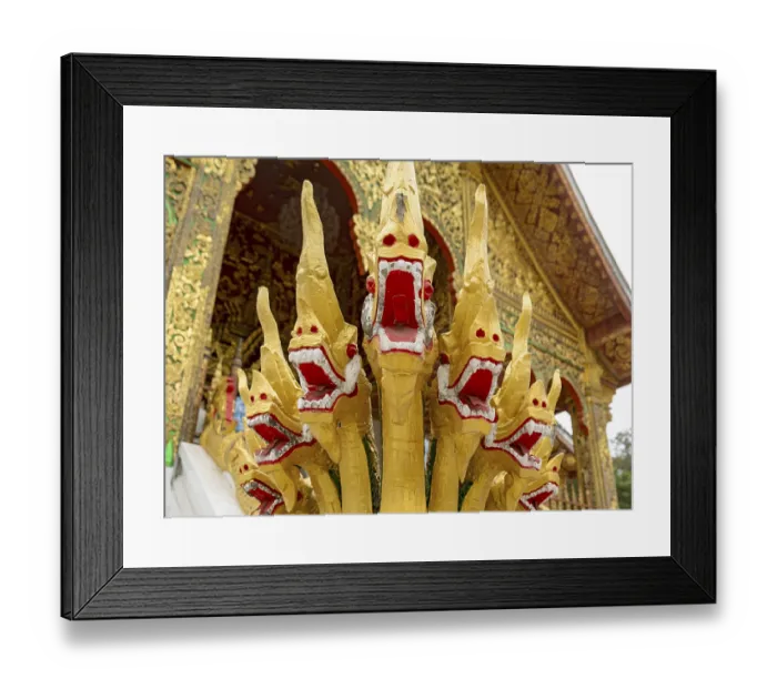 Framed Print : Naga at the steps of Wat Ho Pha Bang temple
