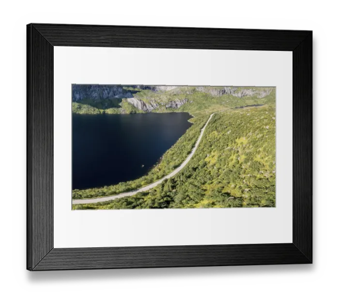 Framed Print : Aerial view of road in mountain scenery along a lake