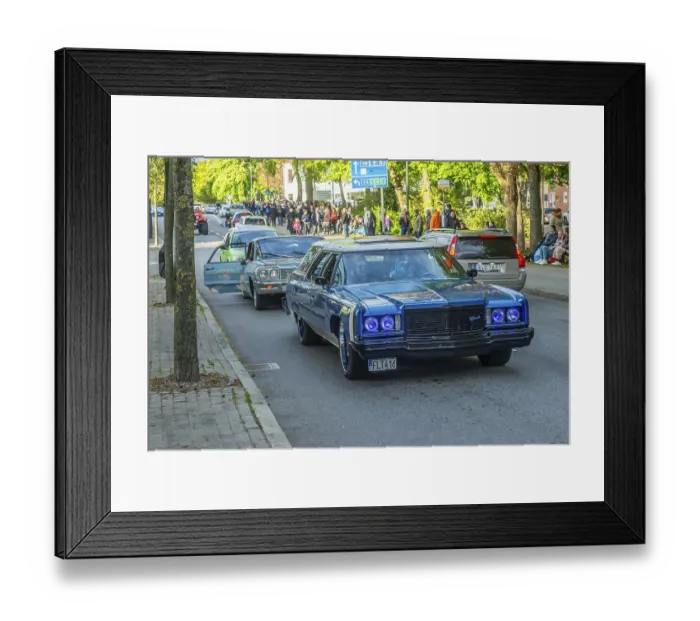 Framed Print : Chevrolet Impala 1975 in cruising with 100s of older American cars on the streets of Ystad