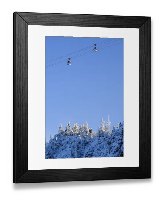 Framed Print : Two gondolas carry people up the mountain Framed Print : Two gondolas carry people up the mountain