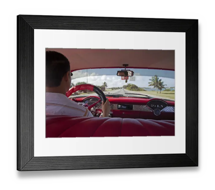 Framed Print : Cuban taxi driver and interior of old 1950s vintage American car