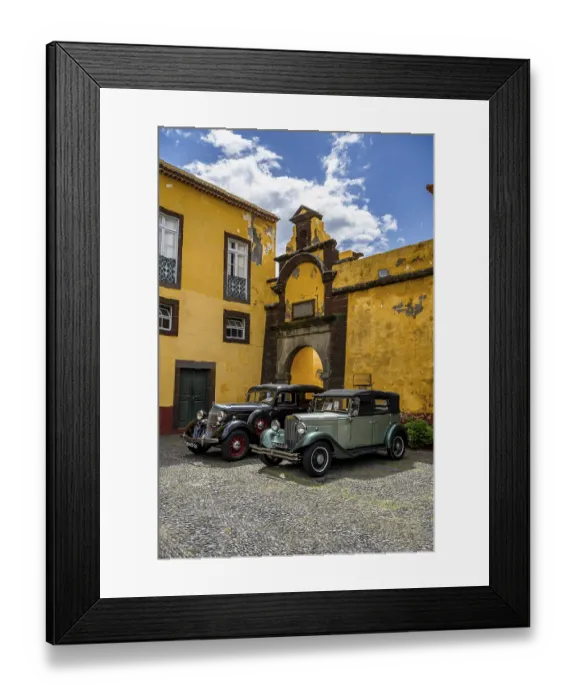 Framed Print : Vintage cars parked in front of yellow gate and wall Framed Print : Vintage cars parked in front of yellow gate and wall