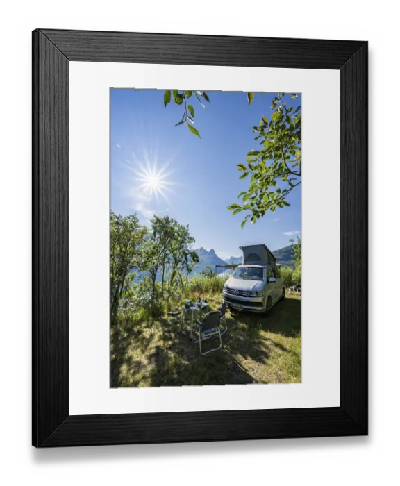 Framed Print : Camper standing by fjord with view of mountains Framed Print : Camper standing by fjord with view of mountains