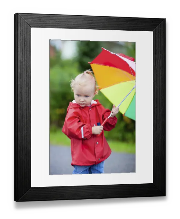 Framed Print : A little girl with an umbrella