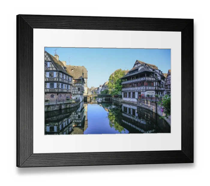 Framed Print : Half-timbered houses in the former tanners quarter La Petite France on the River Ill