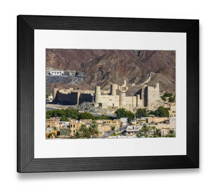 Framed Print : View of the town of Bahla, with the clay fortress of Hisn Tamah in the background Framed Print : View of the town of Bahla, with the clay fortress of Hisn Tamah in the background