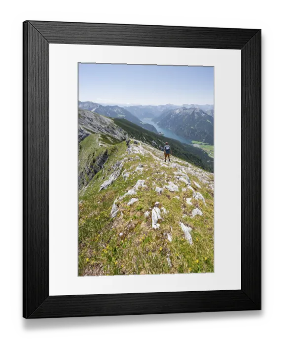 Framed Print : Mountaineer on the summit ridge of the Unnuetz