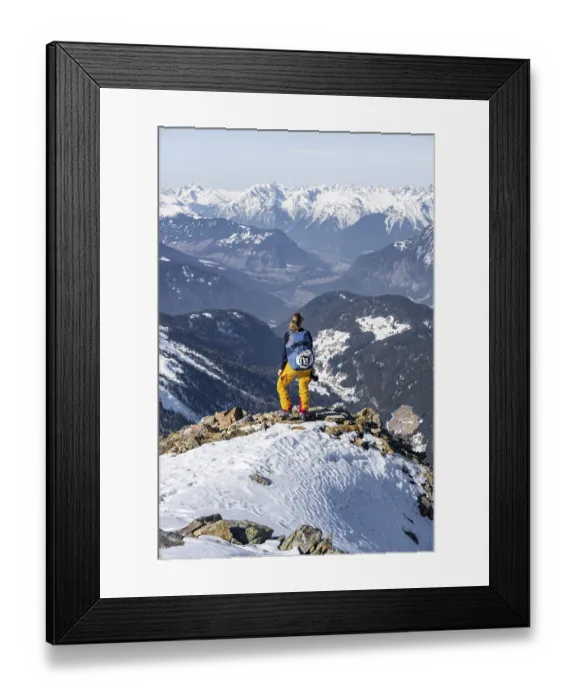 Framed Print : View of the Inn Valley, mountaineer at the summit of the Pirchkogel