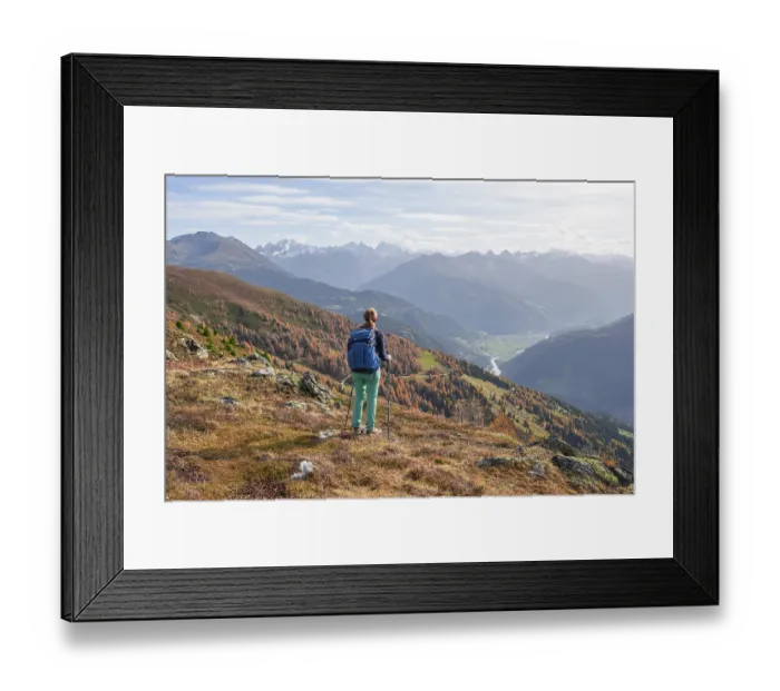 Framed Print : Mountaineer in the mountains in autumn